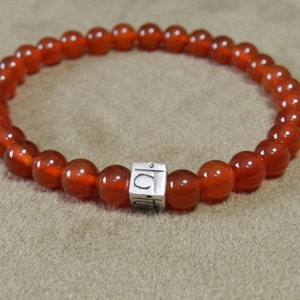 Chakra Healing Bracelet - Carnelian with Silver Symbol Bead