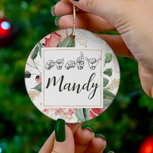 ASL Name Ornament: Personalized Christmas Ornament with Name in ASL Fingerspelling with Red, Green, and Gold Floral Design, 2.76&quot; Ornament