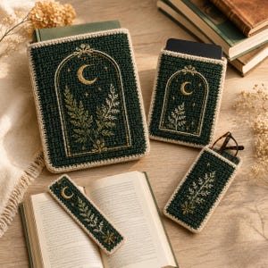 May include: A set of dark green crochet accessories including a book cover, a tablet sleeve, a glasses case, and a bookmark. Each item features an embroidered arch design with a crescent moon, stars, and fern leaves in cream and gold thread.