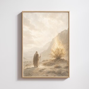 May include: A framed wall art print depicting a figure in a tan robe holding a wooden staff, standing in a desert landscape. To the right, a bush glows with bright, golden light against a backdrop of rocky mountains under a cloudy sky.