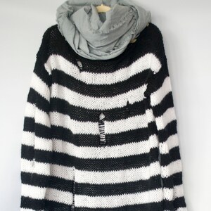white baggy jumper