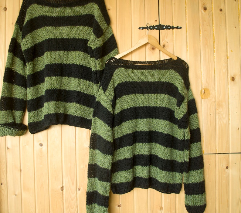 Unisex striped knit pullover sweater with moody forest tones, ideal for grunge fashion lovers or streetwear looks with a handmade twist.