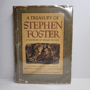 May include: A green book titled "A Treasury of Stephen Foster" with a black and white illustration of a group of people on the cover. The book has a foreword by Deems Taylor, illustrations by William Sharp, historical notes by John Tasker Howard, and piano arrangements by Ray Lev and Dorothy Berliner Commins.