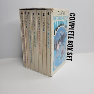 May include: A complete box set of C.S. Lewis's "The Chronicles of Narnia" books. The set includes "The Lion, the Witch, and the Wardrobe," "The Magician's Nephew," and other titles. The box set is white with black text.