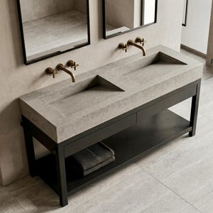 Lavabo de hormigón con doble rampa sobre base de acero / Baño moderno de hormigón