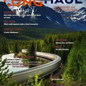 May include: A magazine cover titled The Long Haul Issue 26 featuring a train curving through a dense green forest beside a river with snow-capped mountains in the background. Text includes Gallons Per Mile, Diesel Electric, Locomotive of the Month, High-Speed Rail, Maglev, and The Rocky Mountaineer.