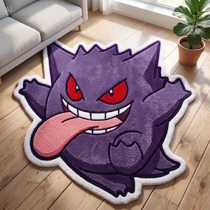 May include: A purple, plush, character-shaped rug featuring a grinning creature with pointed ears, sharp red eyes, and a long, protruding pink tongue. The rug has a thick white border outlining the entire shape of the character's body.