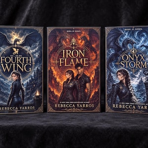 May include: Three hardcover books by Rebecca Yarros titled Fourth Wing, Iron Flame, and Onyx Storm. Each cover features intricate fantasy illustrations of dragons, characters in dark attire, and dramatic landscapes with gold-toned decorative borders.