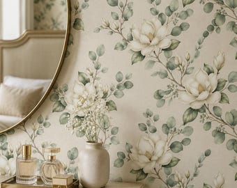 May include: Wallpaper featuring a repeating pattern of white magnolia flowers and green eucalyptus leaves on a cream background. The design includes blooming flowers, buds, and slender stems, creating a botanical motif across the wall surface.