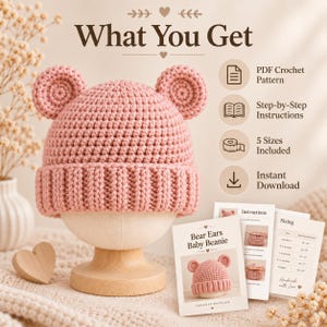 May include: A dusty pink crochet beanie with two round bear ears on top, displayed on a wooden stand. The image includes text stating What You Get, PDF Crochet Pattern, Step-by-Step Instructions, 5 Sizes Included, and Instant Download.