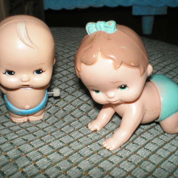 1977 Tomy crawling Baby and Tomy windup doll