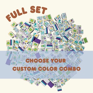 May include: A full set of Mahjong tiles in a variety of colors, including white, purple, teal, and green. The tiles feature various symbols and designs. Text on the image reads "FULL SET" and "CHOOSE YOUR CUSTOM COLOR COMBO."
