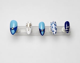 Goud- en blauwkleurige strandprint persset