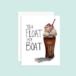 May include: A watercolor illustration of a root beer float with the text "You float my boat" on a white background.
