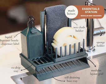 Organizador modular para fregadero de cocina con soporte para esponja, dispensador de jabón y soporte para paños.