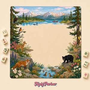 May include: A square play mat featuring a nature scene with mountains, a lake, and forest animals including a fox, deer, bear, and birds. The center is a solid beige area. Scattered around the mat are several white mahjong tiles with green and red symbols.