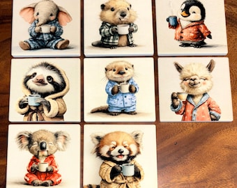 Keramische onderzetters met dieren die koffie of thee drinken.