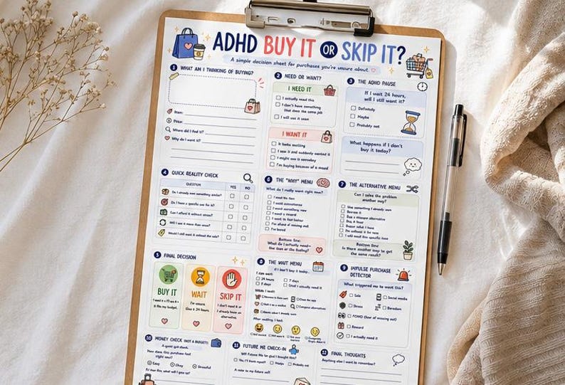 May include: A clipboard holding a printed decision sheet titled ADHD BUY IT OR SKIP IT? featuring sections for purchase evaluation, including checklists, icons, and prompts to help determine if an item is a need or a want, with a black pen attached.