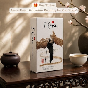 May include: A white rectangular box for an I Ching deck featuring a black ink illustration of a figure walking through a landscape with mountains. The text reads I Ching, Klaus Holitzka, and Based on the Ancient Wisdom of China with a red seal.