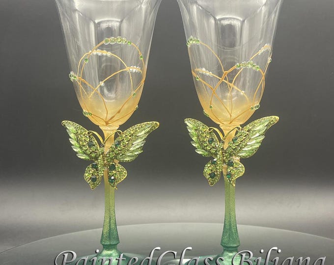 Green butterfly pained wine glasses