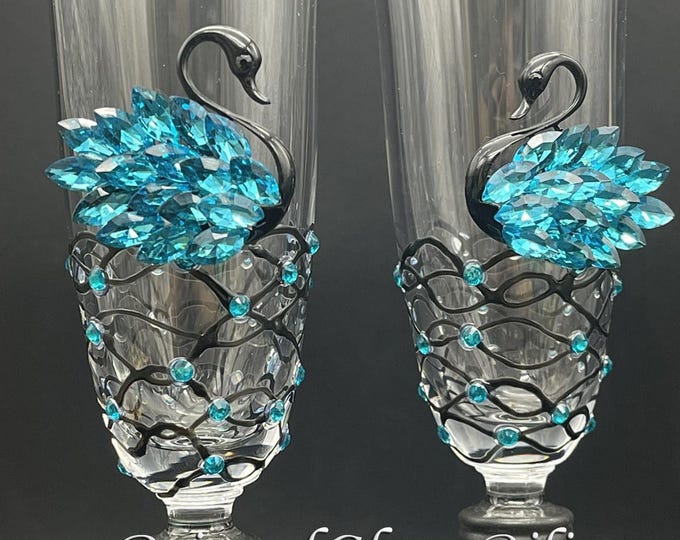 Blue swan toasting champagne flutes