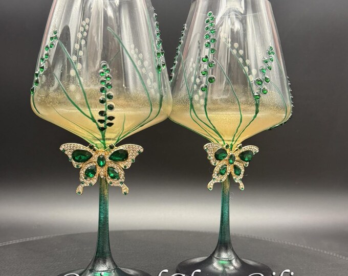 Emerald green butterfly pained wine glasses