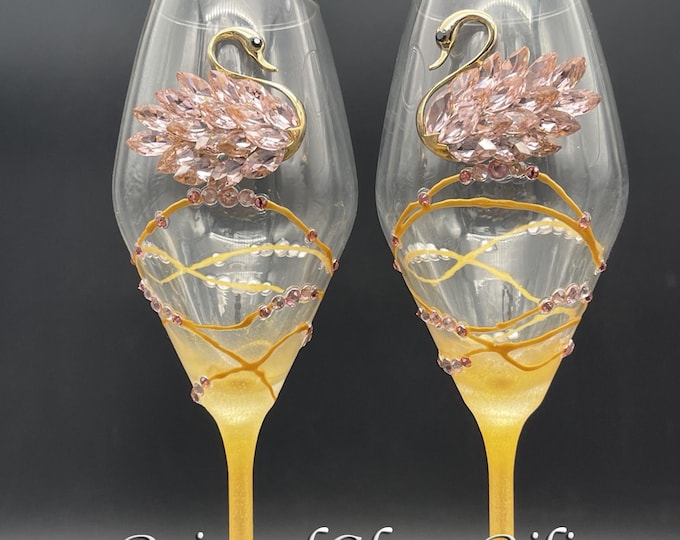 Pink swan toasting wine glasses