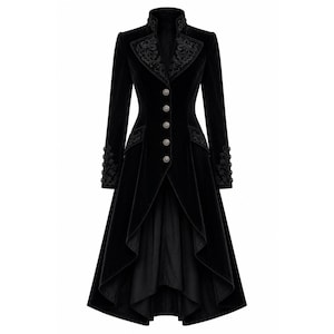 May include: A black velvet coat featuring a high collar, long sleeves, and a front button closure. The garment includes intricate tonal embroidery on the lapels, cuffs, and pocket areas, with a high-low hemline that is shorter in the front.