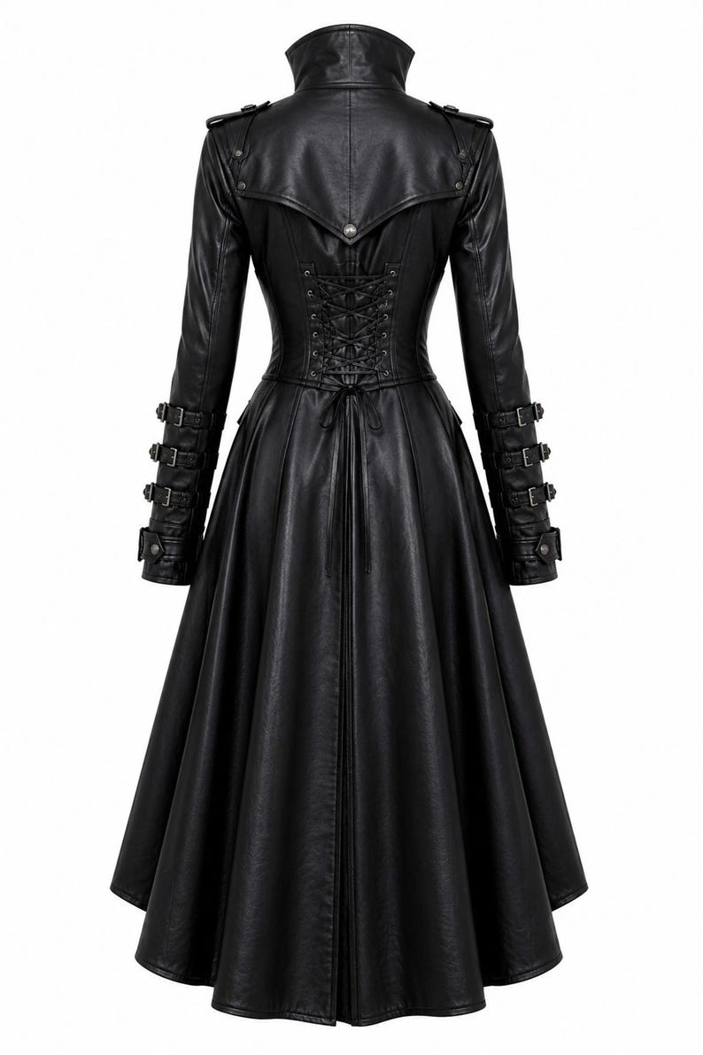 May include: A black long-sleeved coat featuring a high collar, a flared skirt, and a back corset-style lace-up closure. The sleeves are adorned with three horizontal buckled straps on each forearm, and the shoulders feature decorative epaulets.