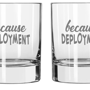 May include: Set of two clear glass tumblers with the text "because deployment" etched on each glass.