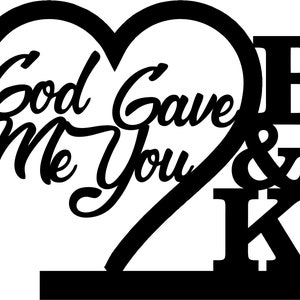 May include: Black and white silhouette of a heart with the text "God Gave Me You" inside. Below the heart are the letters "B & K" in a block font.