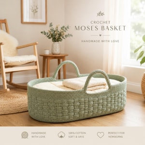 May include: A sage green oval crochet Moses basket with a woven texture and two integrated handles. Inside the basket lies a folded cream-colored textile. The text CROCHET MOSES BASKET HANDMADE WITH LOVE is visible above the basket.