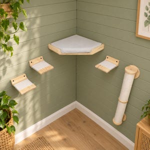 May include: A wall-mounted cat furniture set featuring a large triangular corner platform, two smaller rectangular steps, and a vertical cylindrical scratching post. Each piece is constructed from light-colored wood with soft gray fabric pads.