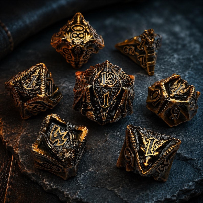 Seven-piece black and antique bronze dragon-themed metal DND dice set with raised numbers and sculpted fantasy details. The polyhedral dice are arranged around a centered D20 on a dark stone surface.