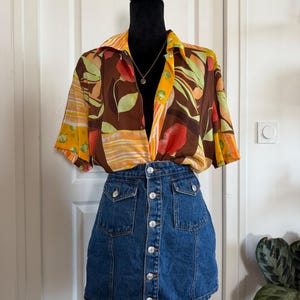 Vintage 90-talsblus med blommig lapptäcke – Färgglad retroskjorta med knappar – Stor storlek