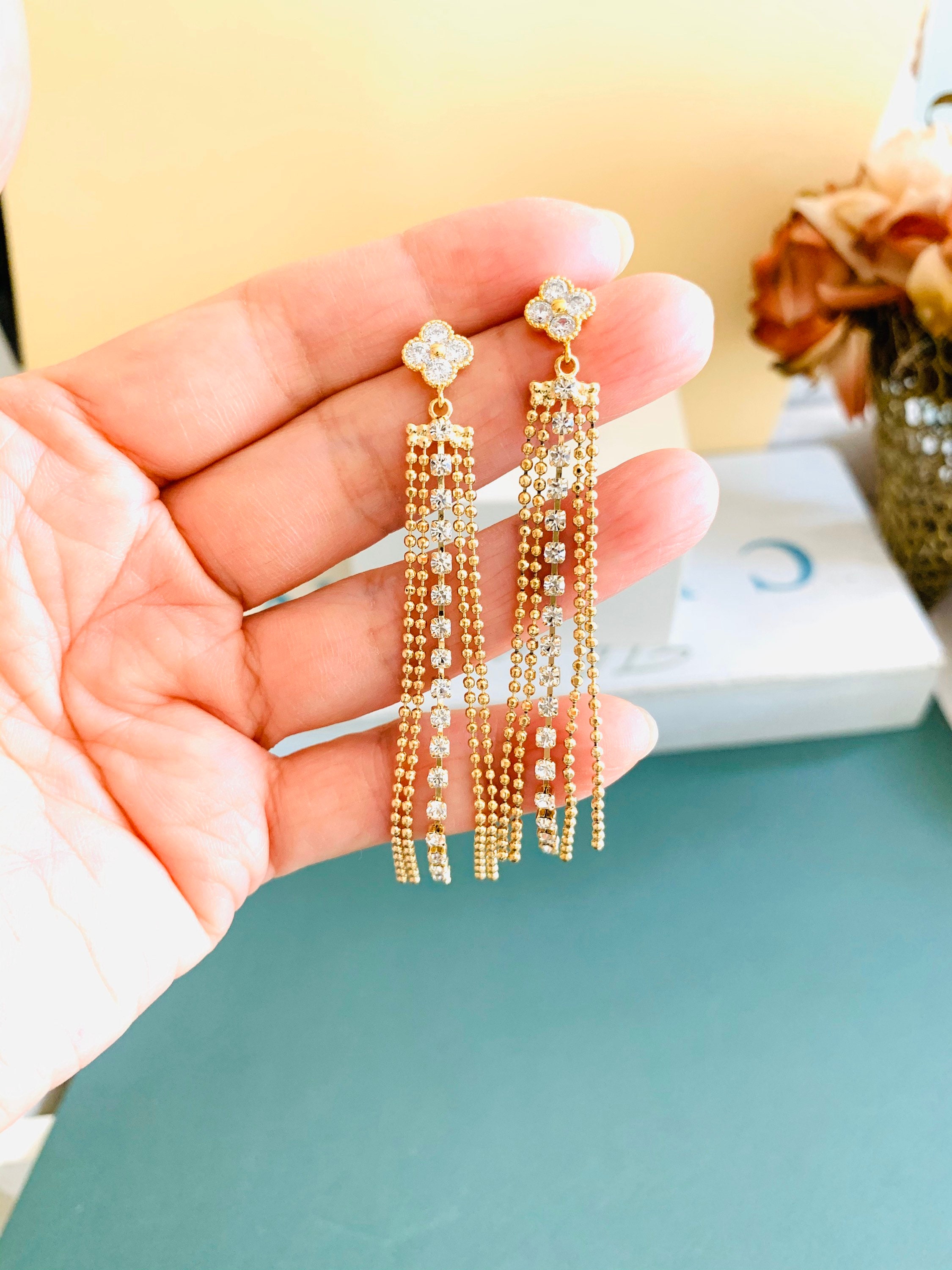 Long chain sale gold earrings design