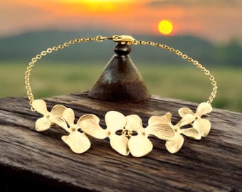 Pulseira de Orquídea em Ouro Rosa: Joia de Noiva Resistente a Manchas