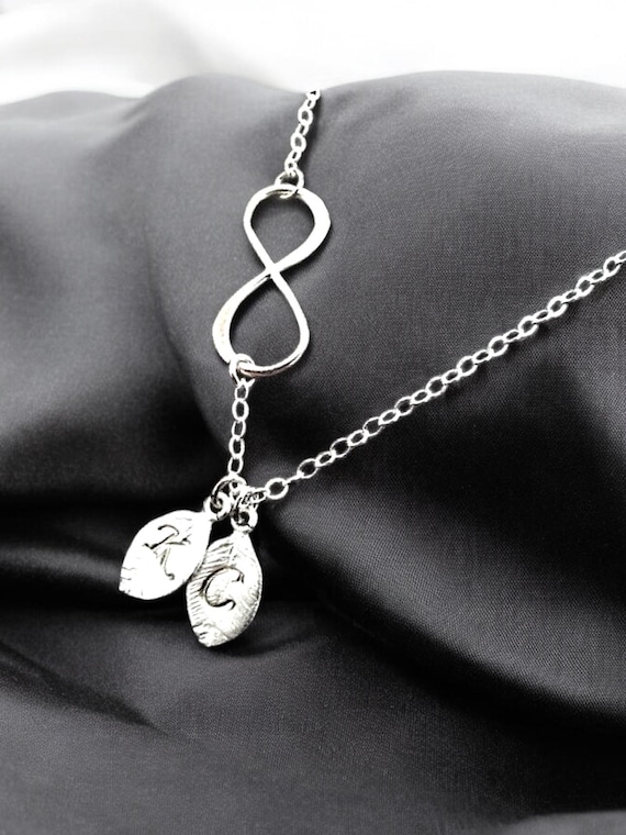 nuova collana con ciondolo wicca e infinito fatta a mano per donna