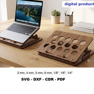 May include: A wooden laptop stand featuring a series of hexagonal cutouts for ventilation, shown in an assembled state holding a laptop and as a separate unit. The text digital product, 3 mm, 4 mm, 5 mm, 6 mm, 1/8", 1/6", 1/4", SVG, DXF, CDR, PDF is visible.