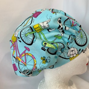 Dog Scrub Hat Bouffant Style;  Dogs on Bicycles