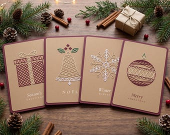 May include: Four rectangular greeting cards with brown paper covers featuring geometric string art designs of a gift box, a bell, a snowflake, and an ornament. The cards display the text Season's Greetings, NOËL, Winter WISHES, and Merry CHRISTMAS.