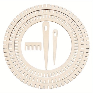 May include: A set of three light-colored wooden circular weaving looms of varying sizes, each featuring evenly spaced notches along the outer edge. Included are two flat wooden needles with large eyelets and a small rectangular weaving comb.