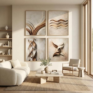 May include: A set of four square framed wall art pieces featuring abstract, flowing, three-dimensional shapes in shades of cream, beige, and warm brown, arranged in a grid pattern on a light-colored wall above a cream-colored sofa and chair.