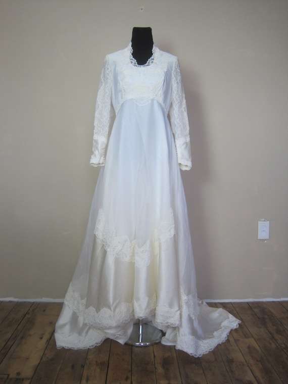 vintage simple elegant wedding dresses Vintage-Inspired Silk Dress with Deep V-Neckline Made of classic satin fabric Simple Elegant Vintage Wedding Dresses