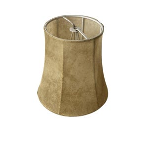 May include: A beige lampshade with a textured finish and a silver metal frame. The lampshade has a distinctive, flared design, broader at the top and bottom. The internal metal frame supports the shade's structure.