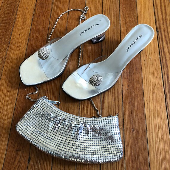 silver sandals and clutch bag