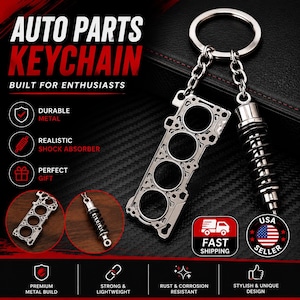 May include: A metal keychain featuring a silver-toned engine head gasket charm and a black and silver shock absorber charm attached to a circular split ring. The text on the image reads AUTO PARTS KEYCHAIN, BUILT FOR ENTHUSIASTS, DURABLE METAL, REALISTIC SHOCK ABSORBER, PERFECT GIFT, FAST SHIPPING, USA SELLER, PREMIUM METAL BUILD, STRONG & LIGHTWEIGHT, RUST & CORROSION RESISTANT, STYLISH & UNIQUE DESIGN.