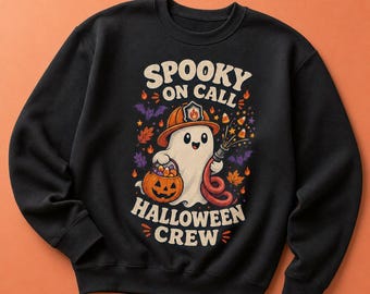May include: A black crewneck sweatshirt featuring a graphic of a ghost wearing a firefighter helmet, holding a pumpkin bucket filled with candy corn and a fire hose. The text reads SPOOKY ON CALL HALLOWEEN CREW, surrounded by bats, leaves, and flames.