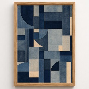 Può includere: Un'opera d'arte da parete incorniciata con una composizione geometrica in varie tonalità di blu, grigio e beige. Il design è composto da forme rettangolari, quadrate e semicircolari disposte a griglia con una texture simile al tessuto denim.