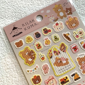J RARE Kawaii Hoja de pegatinas : Sanx Rilakkuma 2021 Papel arrugado TIENDA DE PAN Baguette Pretzel Comida de miel Kiirotori Chairokoguma Korilakkuma